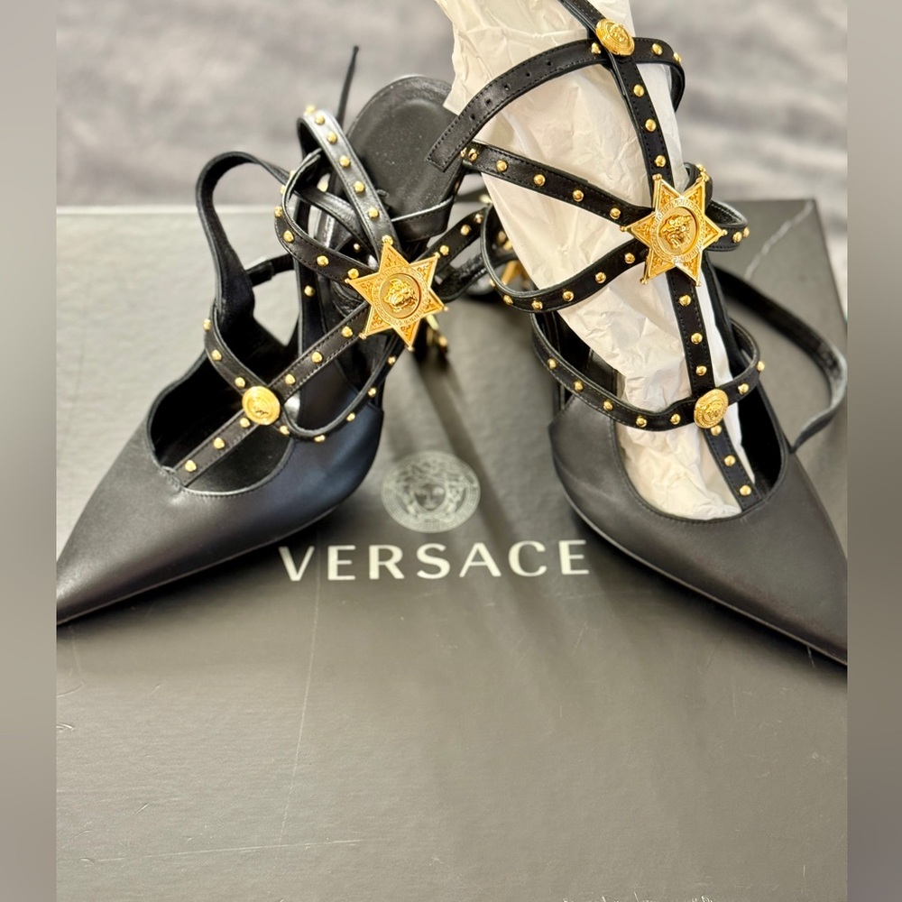 Preowned , authentic,  wear once only ,One of kind black Versace cage pumps
